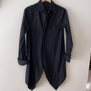 Interesting higher in the back zip front shirt